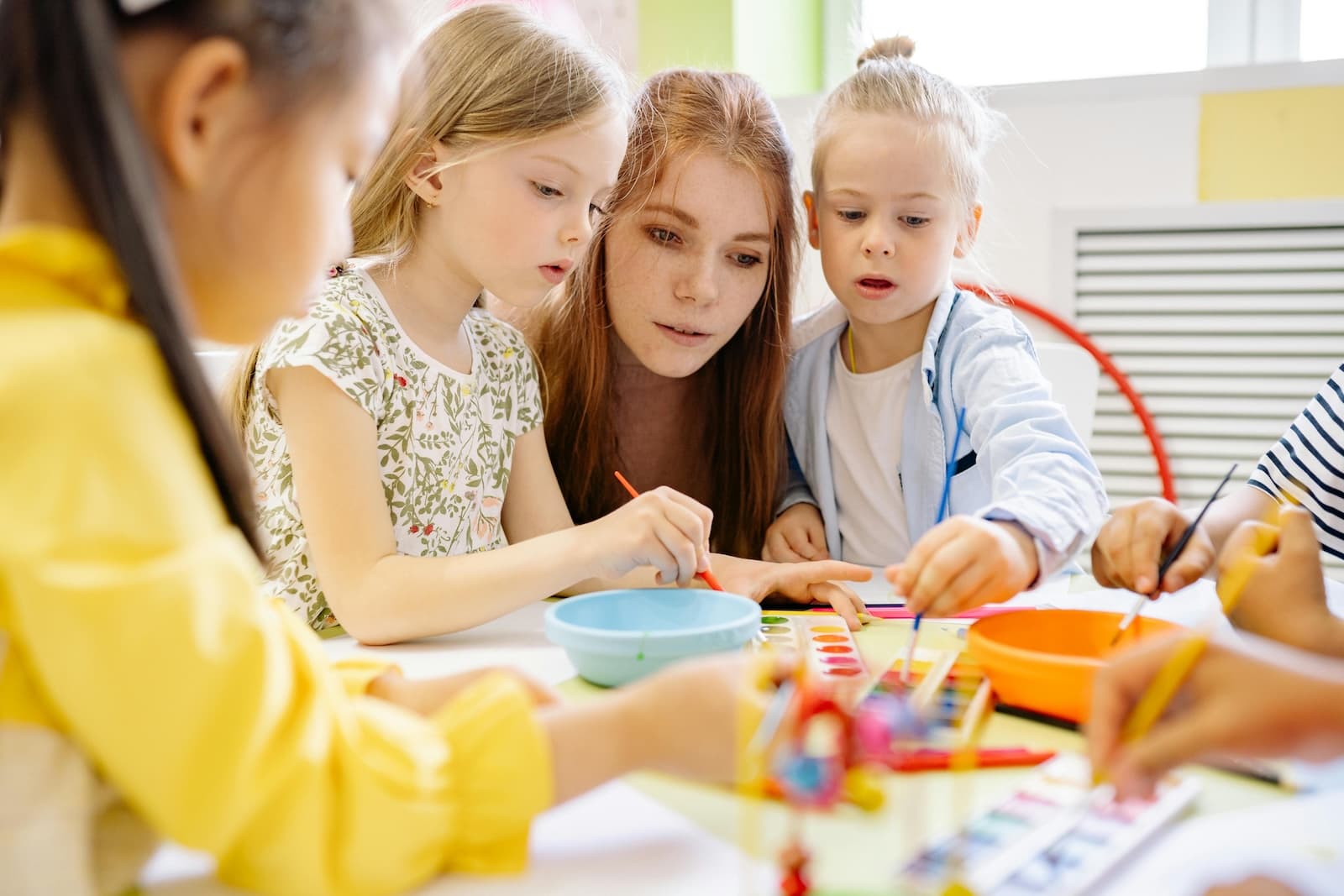 Children painting together